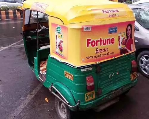 auto rickshaw advertising, Ahmedabad transit branding, mobile outdoor ads, cost-effective local marketing, citywide brand visibility