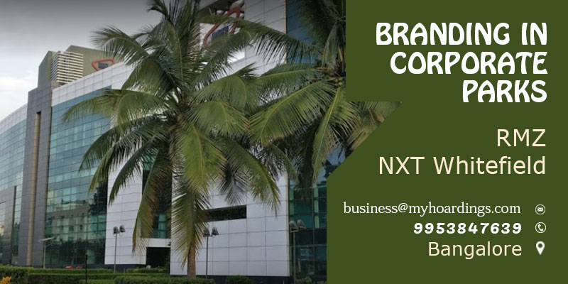 Branding in corporate IT tech parks showcasing outdoor displays, digital screens, and office branding targeting professionals and decision-makers.