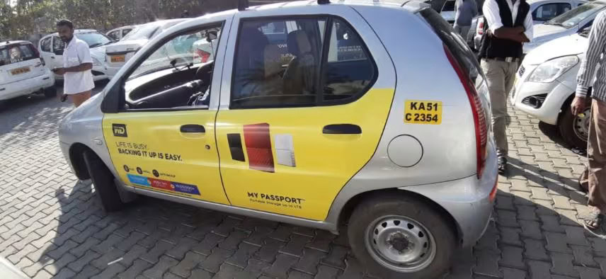 taxi wrap advertising, fleet branding, mobile outdoor campaigns, vehicle marketing, on-the-move visibility, MyHoardings, brand engagement